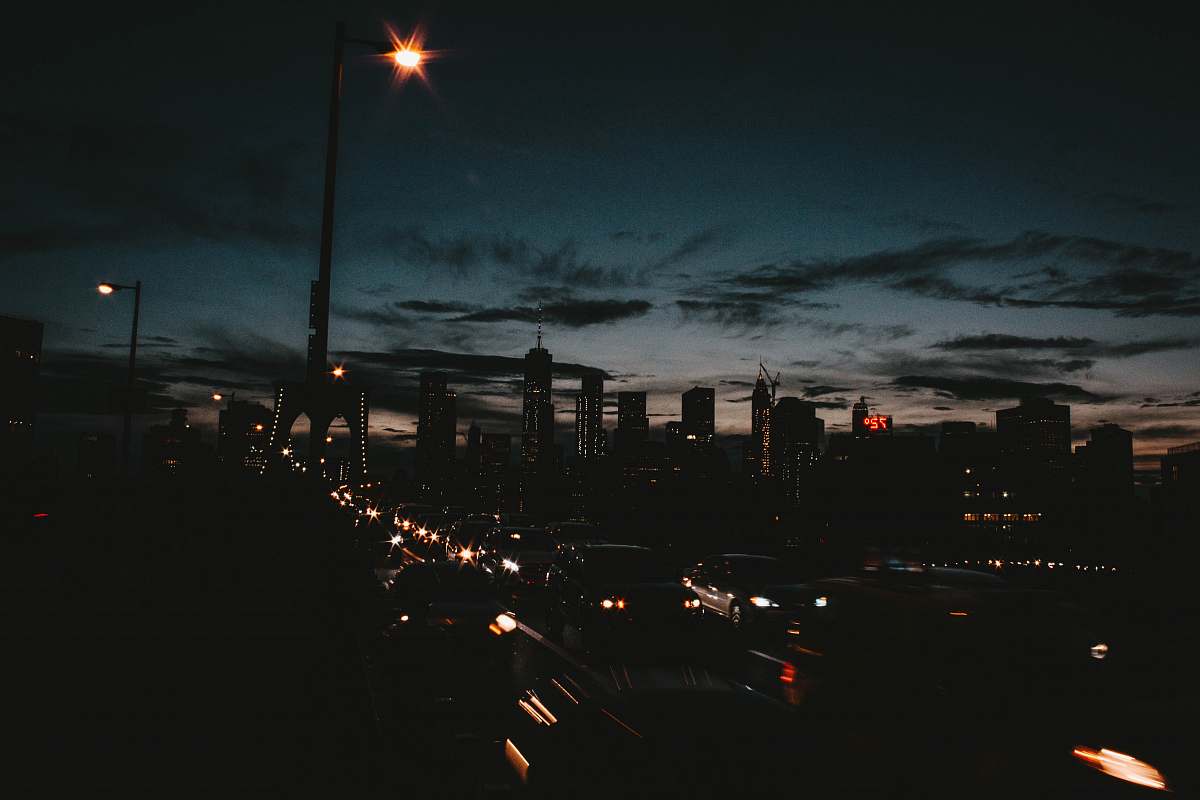 brooklyn bridge photo of busy road near high-rise buildings new york